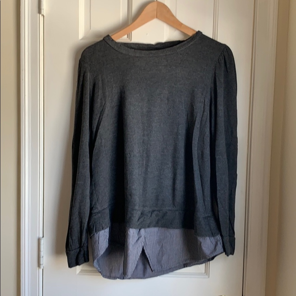 Sweatshirt with attached shirt at hem